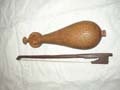 Hand_carved_guzla_and_bow_back